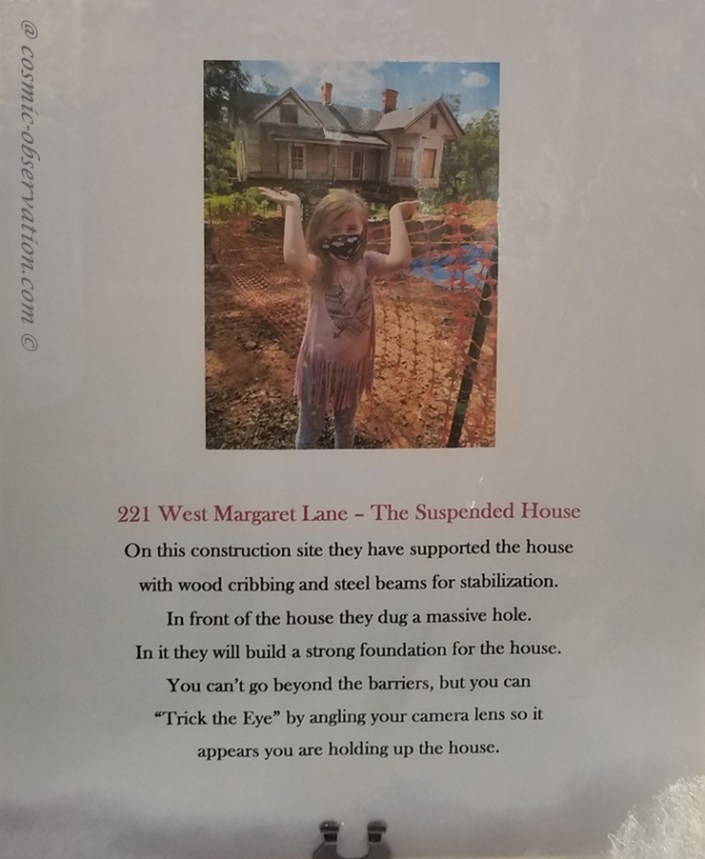 Girl Holds Up House Image Two